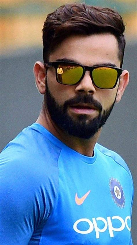 virat kohli with glasses.